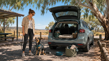 Illustration of a dog and handler taking a shaded rest stop on an Australian road trip