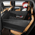 Dog car seat cover installed in back seat with hardboard support