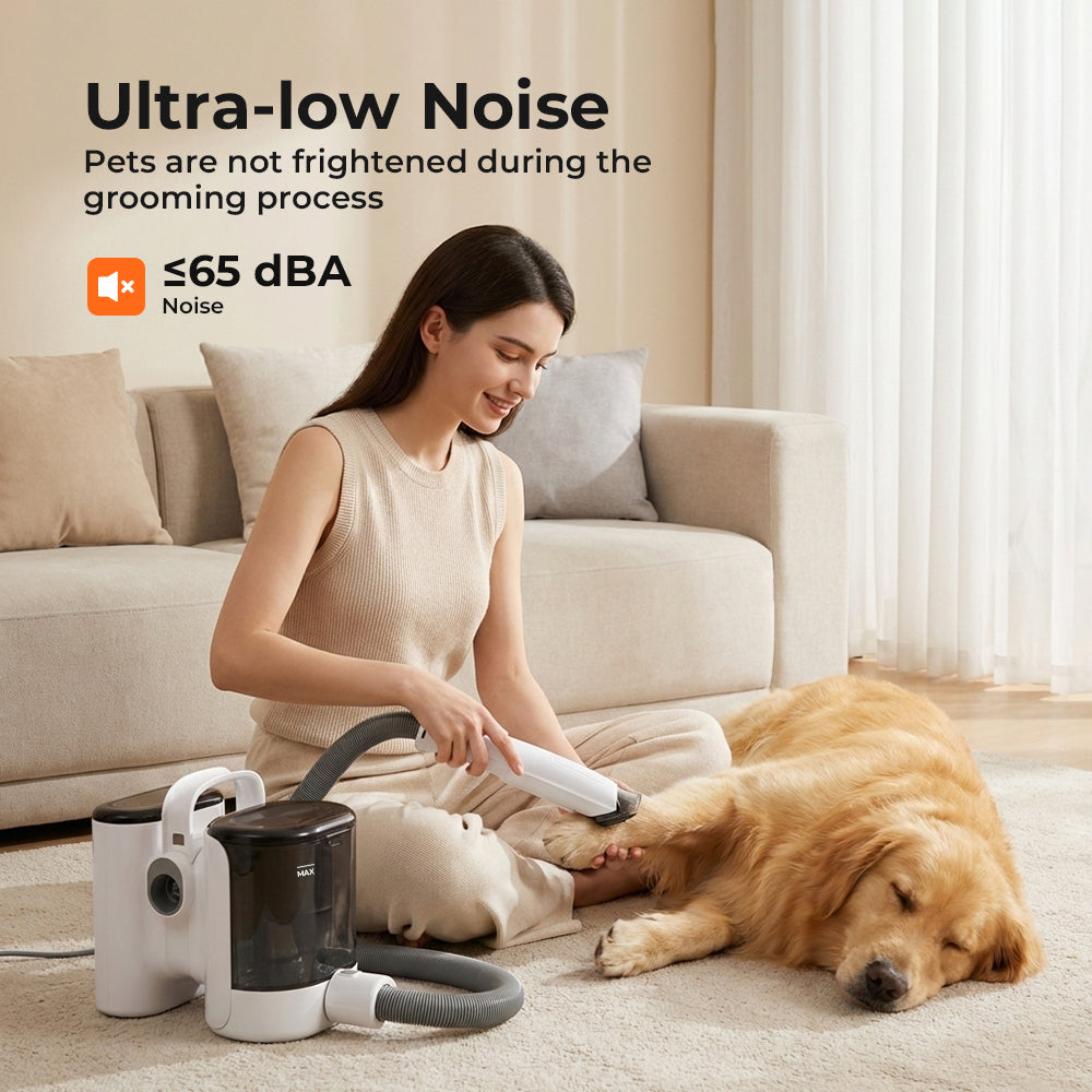 Woman grooming a dog with a pet grooming kit in a living room, emphasizing ultra-low noise level.