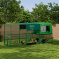 Pets Gear green outdoor chicken coop with extended run and hens in a backyard